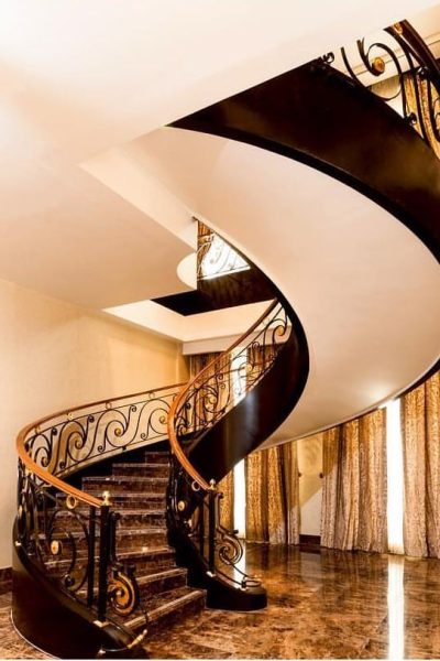 indoor curved stairs in a home in san jose